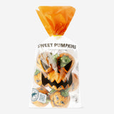 Flying Tiger Copenhagen Cocoa confectionery Halloween pumpkin-shaped chocolates on a festive plate.