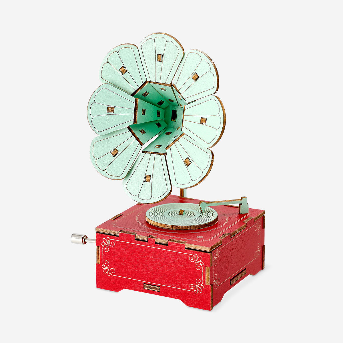 Wooden DIY music box gadget by Flying Tiger Copenhagen, showing the assembled handcrafted music box with intricate wood details.
