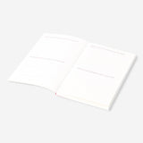 Write-and-burn office journal by Flying Tiger Copenhagen with blank pages and a durable cover for note-taking and creative writing.