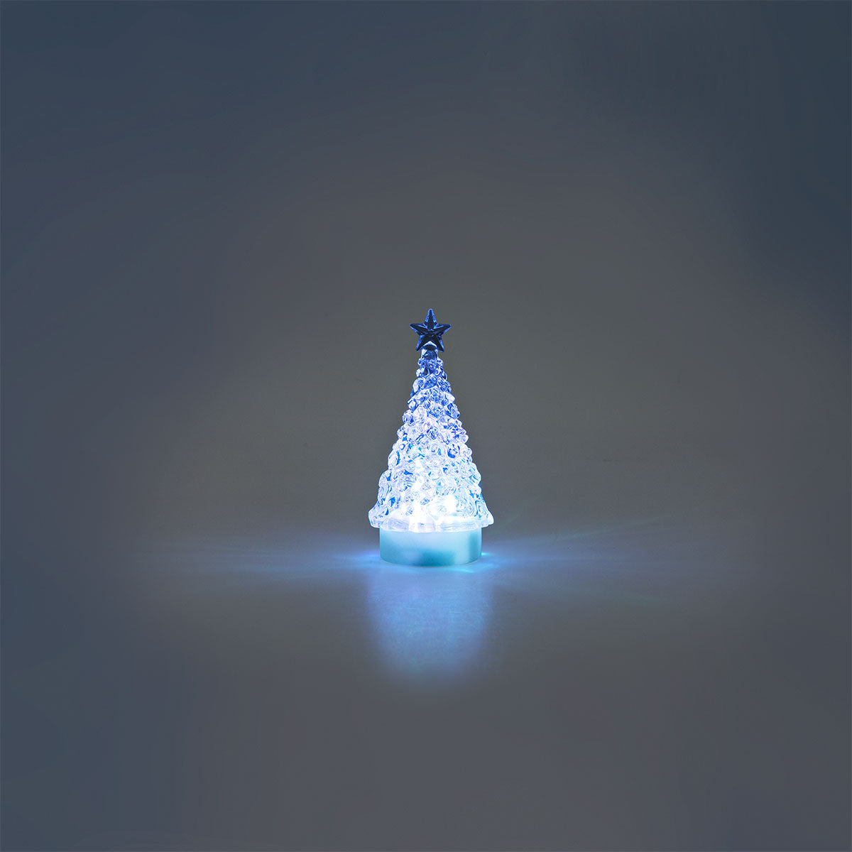 Color-changing glowing tree gadget from Flying Tiger Copenhagen with vibrant lights and a decorative tree shape.