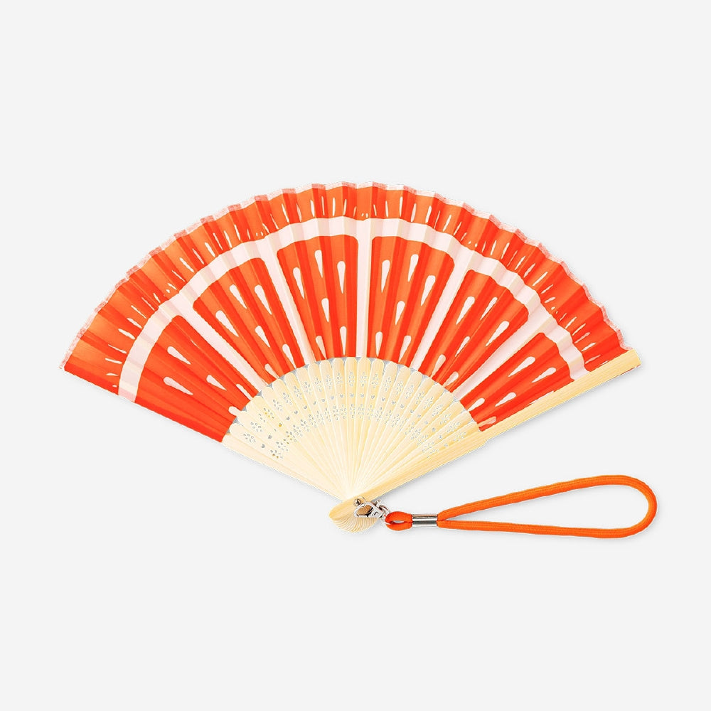 Foldable orange print bamboo fan with strap, textile material, by Flying Tiger Copenhagen, showing its lightweight, portable design.