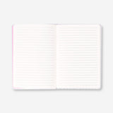 Silver A5 office notebook with a heart design from Flying Tiger Copenhagen, open to show lined pages inside.