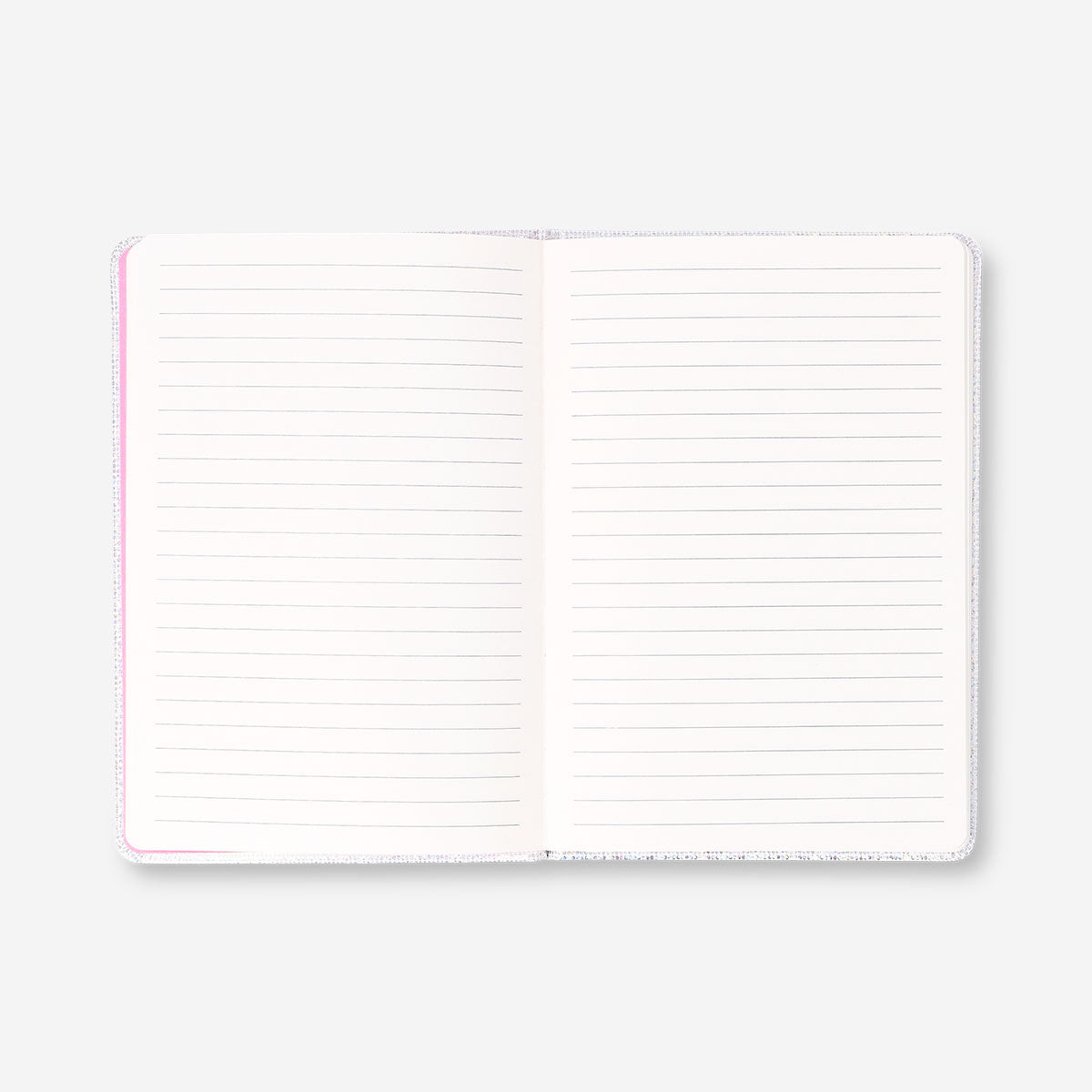 Silver A5 office notebook with a heart design from Flying Tiger Copenhagen, open to show lined pages inside.