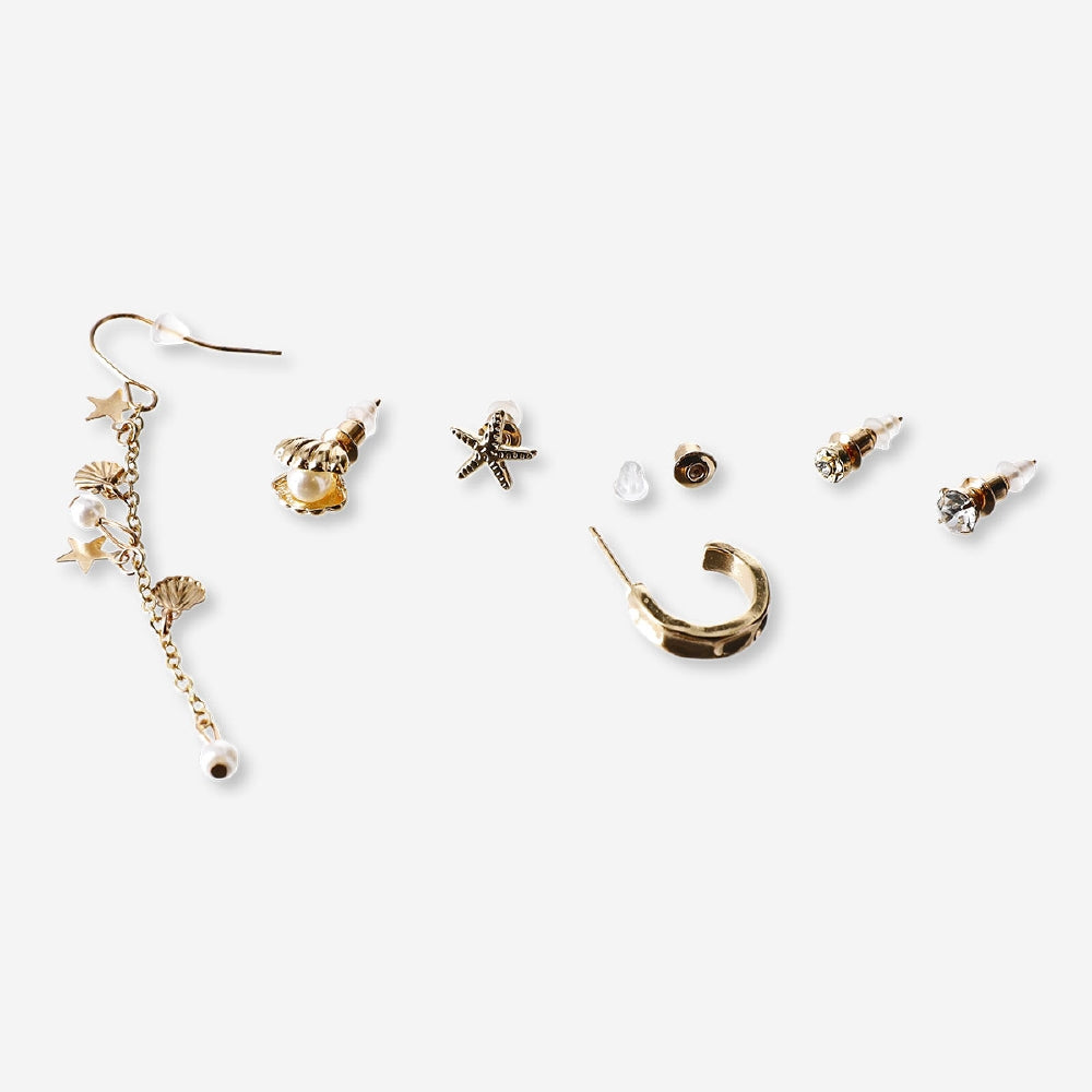 Set of six textile earrings featuring sea icon designs by Flying Tiger Copenhagen, displayed on a neutral background.