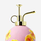 Ceramic mist spray bottle with hibiscus flower print, designed for home use, by Flying Tiger Copenhagen.