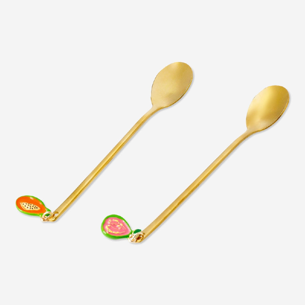 Two gold dessert spoons with colorful fruit decorations from Flying Tiger Copenhagen, ideal for elegant table settings.
