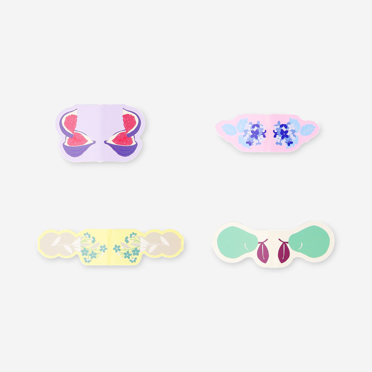 Set of four Flying Tiger Copenhagen magnetic bookmarks featuring colorful summer motifs for office or reading use.