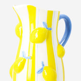 Ceramic kitchen jug with embossed lemon design, 1.2L capacity, by Flying Tiger Copenhagen, featuring a textured lemon pattern on the surface.