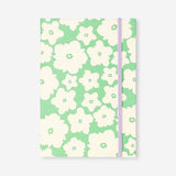 A5 green floral bullet planner from Flying Tiger Copenhagen featuring a floral cover design and office organization pages.
