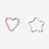 Two textile heart and star-shaped carabiners from Flying Tiger Copenhagen, lightweight and decorative for bags or accessories.