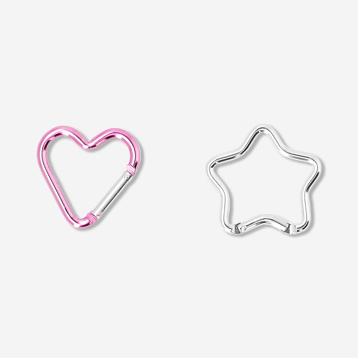 Two textile heart and star-shaped carabiners from Flying Tiger Copenhagen, lightweight and decorative for bags or accessories.