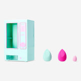 Set of 9 Flying Tiger Copenhagen makeup blender sponges in a vending machine for personal care.