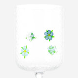 Blue embossed flower wine glass from Flying Tiger Copenhagen, 350 ml, with detailed floral design and clear glass body.
