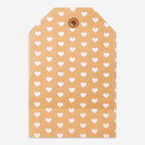 Office gift bag featuring a Manila tag with heart print by Flying Tiger Copenhagen, showcasing a stylish and functional design.