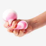 Flying Tiger Copenhagen press me toy with a colorful swirly candy ball design, a fun and tactile gadget for sensory play.