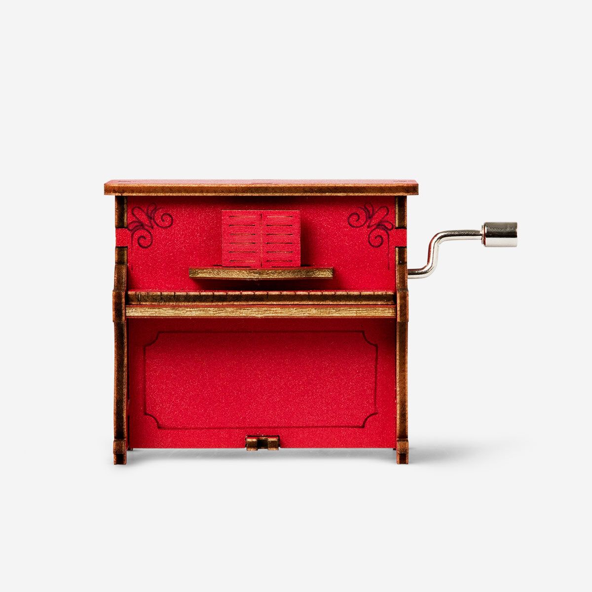Flying Tiger Copenhagen DIY music box gadget with colorful components and a small winding mechanism on a white background.