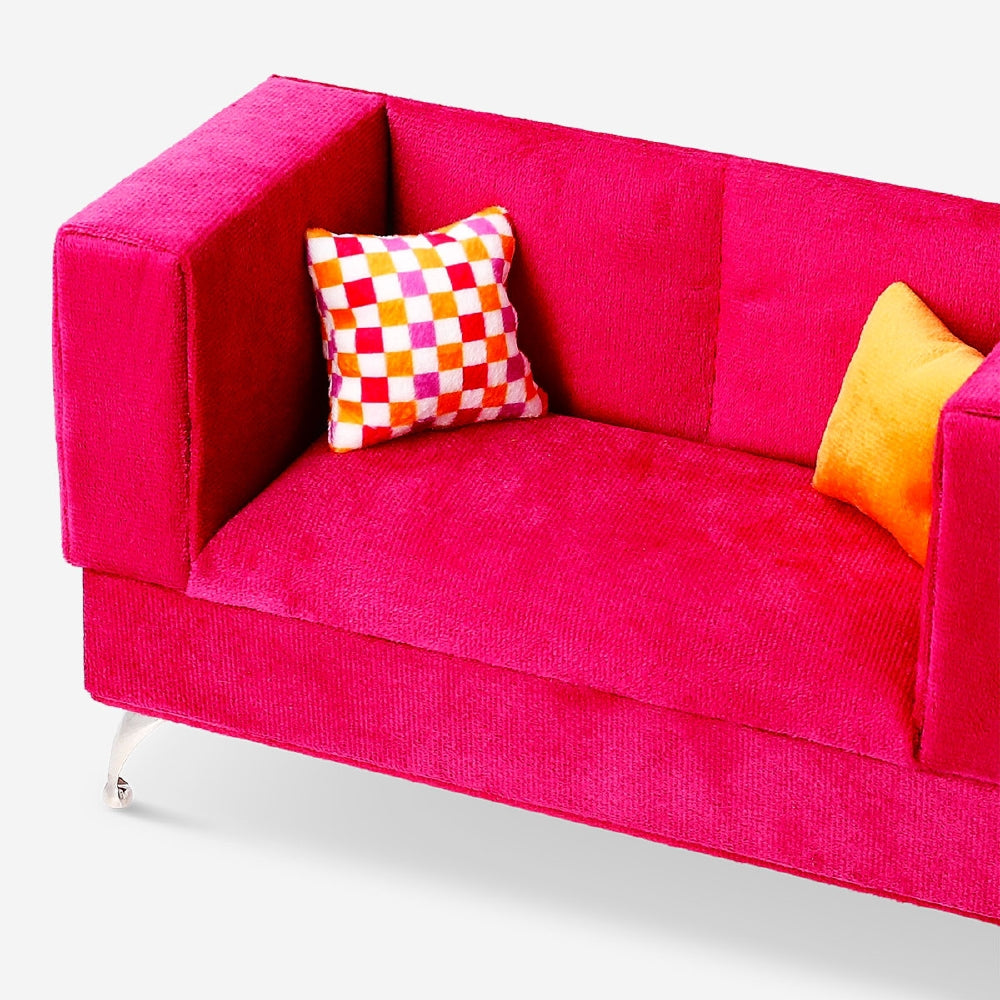 Pink velvet jewellery box designed as a sofa from Flying Tiger Copenhagen, stylish home accessory with detailed fabric texture.