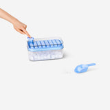Blue ice cube tray with storage box and ice scoop from Flying Tiger Copenhagen for convenient freezer use in the kitchen.