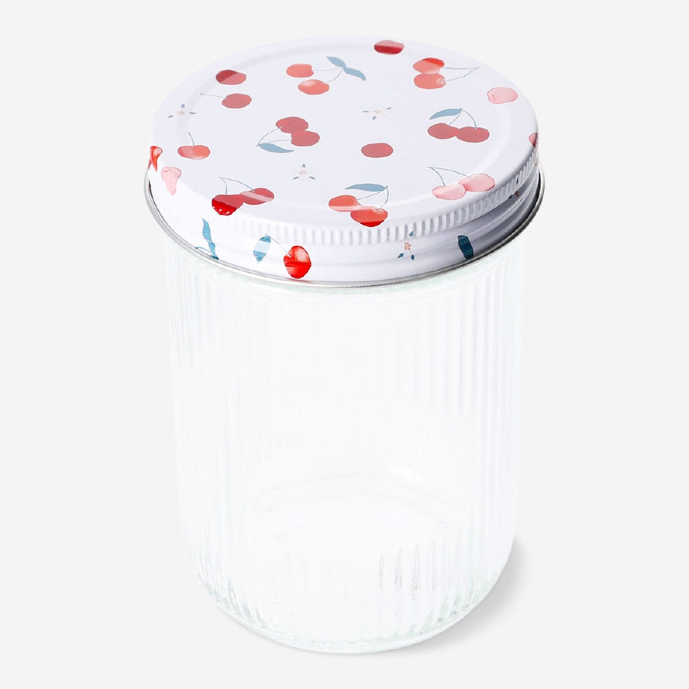Glass storage jar with cherry print lid, 16 cm, from Flying Tiger Copenhagen, featuring a clear jar and colorful cherry design lid.
