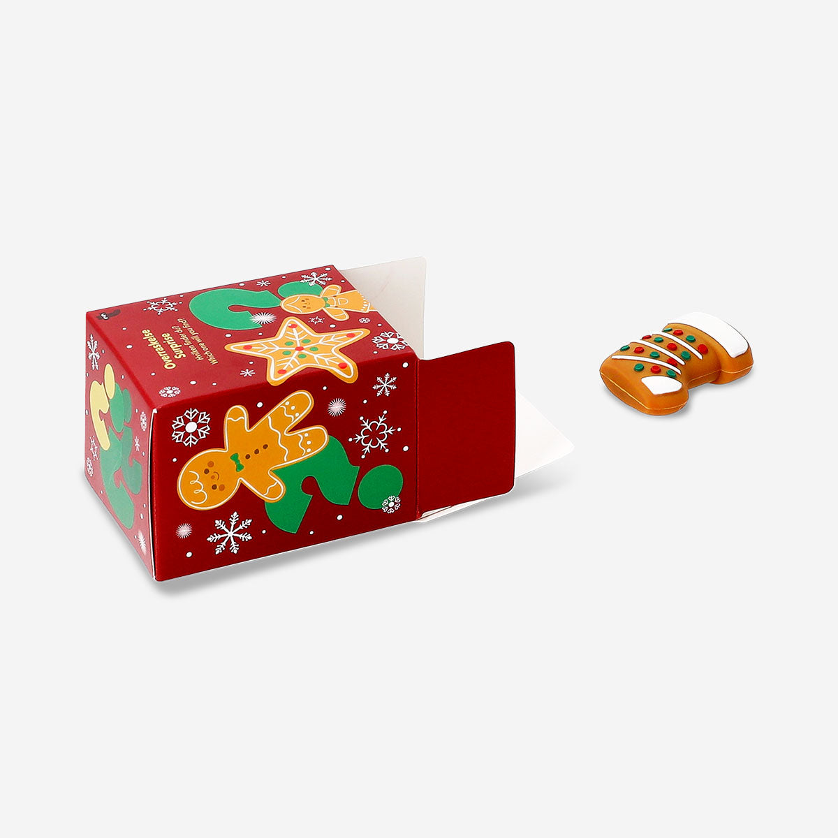 Flying Tiger Copenhagen gingerbread cookies toy collectible surprise in festive packaging with colorful designs and playful imagery.