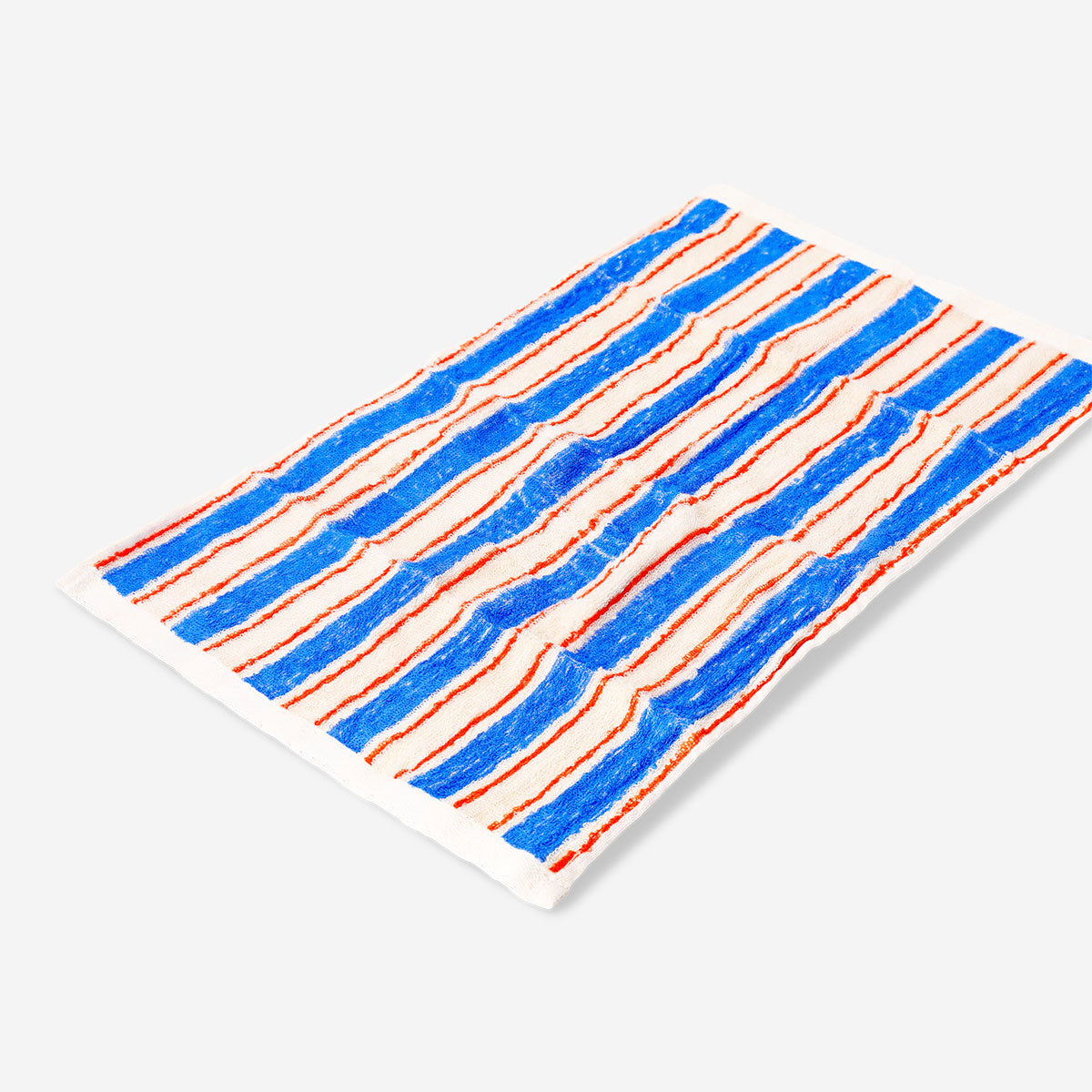 Blue striped Flying Tiger Copenhagen home towel, 30x50 cm, soft fabric with bold blue and white stripes, ideal for bathroom or beach use.