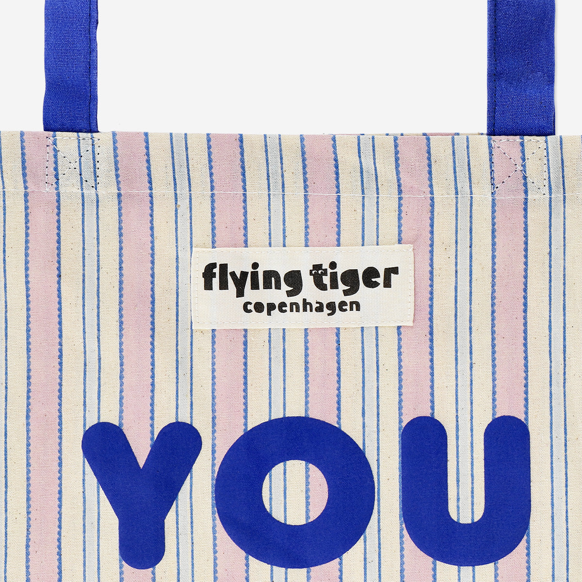 Striped tote bag with blue handles