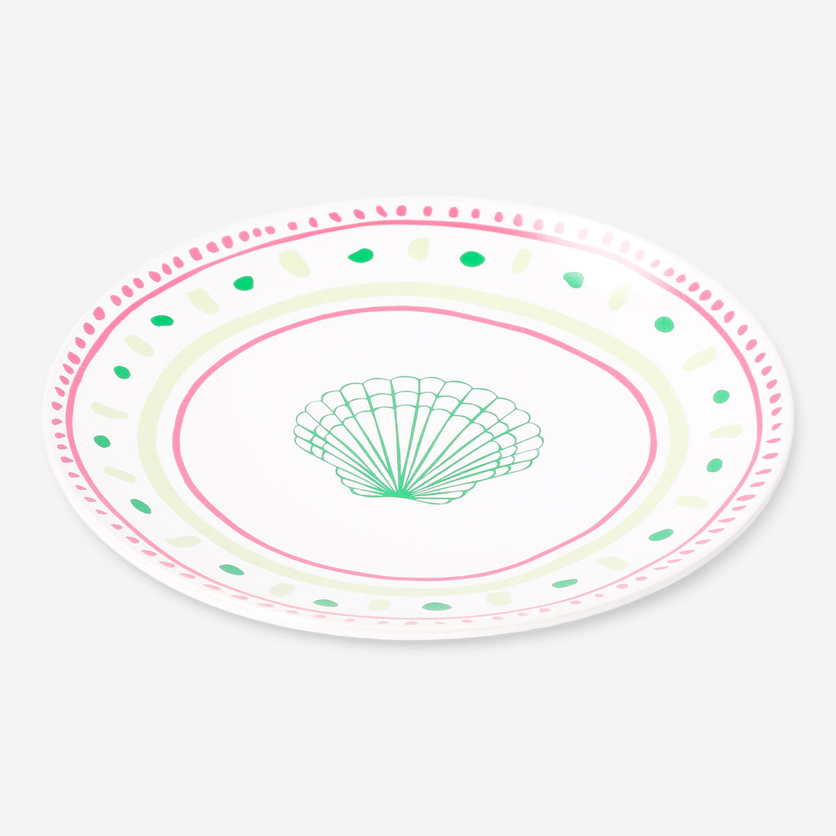 Ceramic kitchen plate with dotted design and seashell pattern, 16 cm, by Flying Tiger Copenhagen, on a white background.