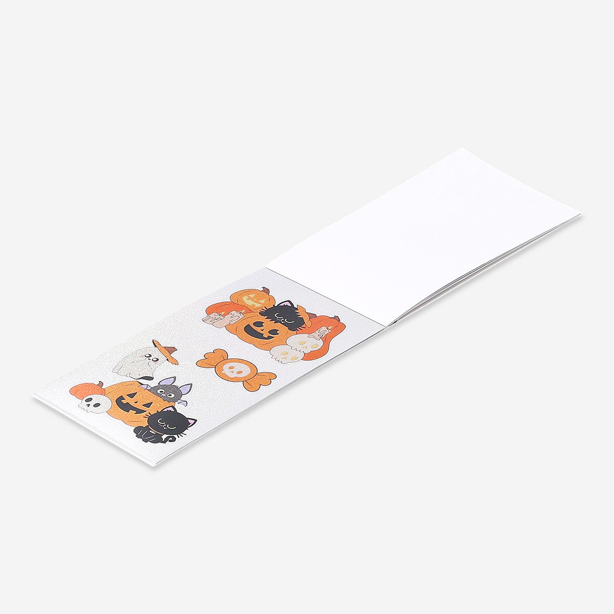 Holographic Halloween stickers from Flying Tiger Copenhagen, featuring spooky designs on a glossy, reflective surface for Halloween crafts.