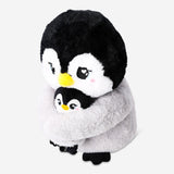 Soft plush penguin toy with a nestling, from Flying Tiger Copenhagen, featuring detailed fabric and adorable design.