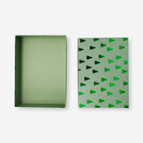 Green gift box with Christmas trees