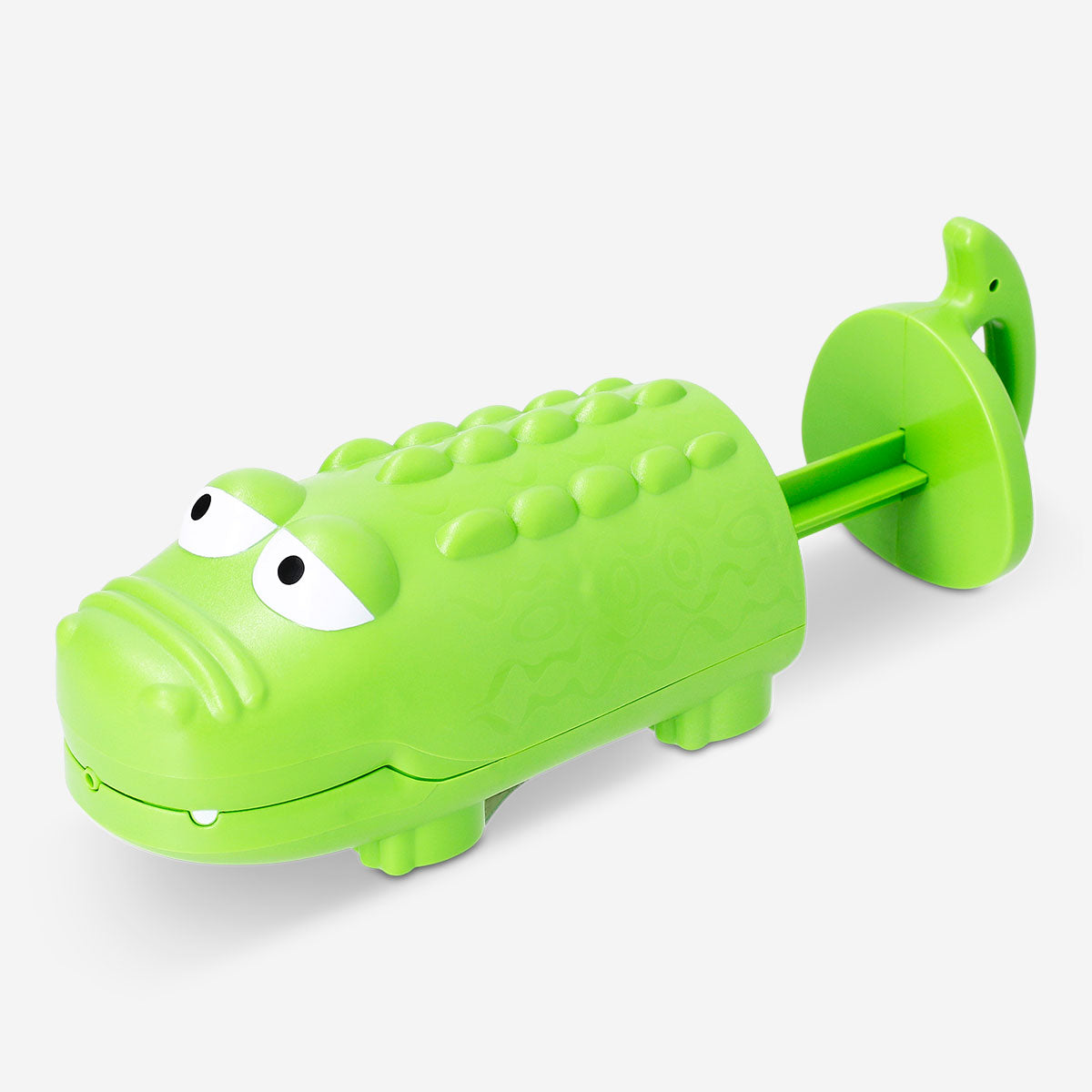 Flying Tiger Copenhagen crocodile toy water pump, colorful plastic toy with a crocodile design for children's water play.