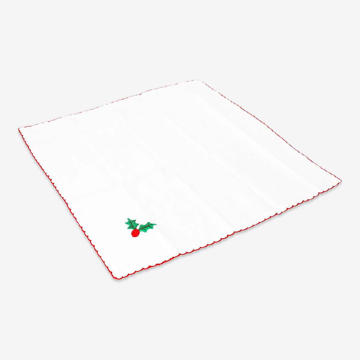 Set of two fabric napkins with festive holly embroidery, perfect for holiday table decor from Flying Tiger Copenhagen
