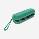 Green Flying Tiger Copenhagen travel case for electrical toothbrush, compact and durable for easy packing and storage.