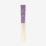 Foldable bamboo fan with purple floral textile design, featuring lightweight construction and vibrant flower pattern by Flying Tiger Copenhagen.