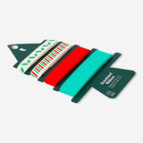 Set of four striped cotton ribbons with holly patterns, ideal for office crafts and decorations by Flying Tiger Copenhagen.