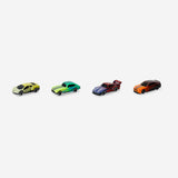 Set of four Flying Tiger Copenhagen colour-changing toy cars with vibrant designs, perfect for kids' play and fun.