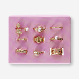 Set of nine adjustable textile rings featuring sea icon designs from Flying Tiger Copenhagen on a neutral background.