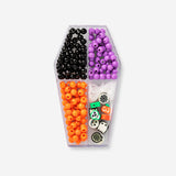 Hobby bead set in coffin-shaped container by Flying Tiger Copenhagen, with colorful beads for crafting and jewelry making.