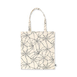 Textile Halloween spider web tote bag by Flying Tiger Copenhagen with black web design on fabric.