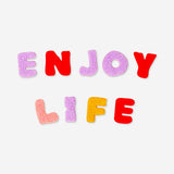 Set of 31 colorful sticky letter patches for textiles, ideal for DIY crafts and sewing projects by Flying Tiger Copenhagen.