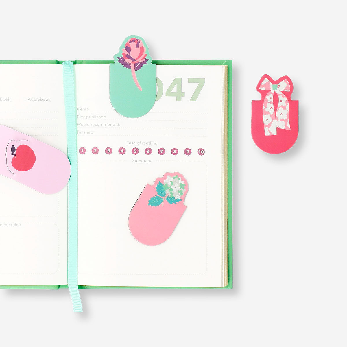 Set of four floral magnetic bookmarks from Flying Tiger Copenhagen, featuring colorful floral designs for office or reading use.