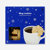 Snowflake-shaped cookies for a mug from Flying Tiger Copenhagen, decorated with festive white icing and snowflake patterns.