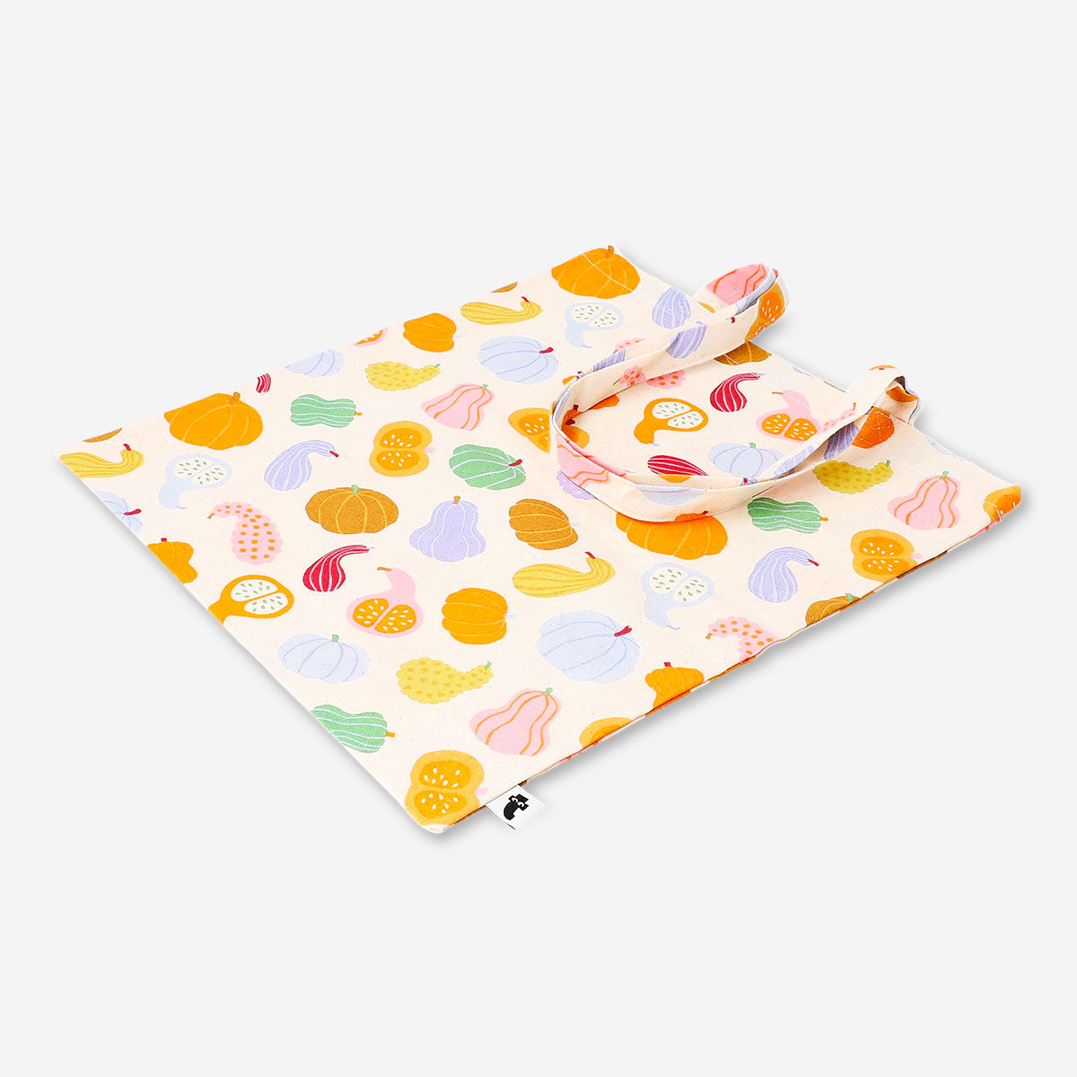 Textile tote bag featuring pumpkin illustrations by Flying Tiger Copenhagen, perfect for casual carrying and seasonal style.