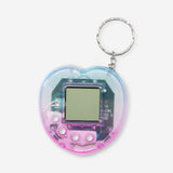 Flying Tiger Copenhagen digital pet keyring gadget featuring a small electronic device with playful pet design.