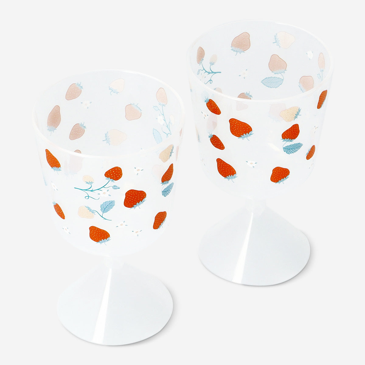 Two clear glass wine glasses with strawberry print, ideal for parties, by Flying Tiger Copenhagen.