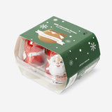 Chocolate Santas with milk filling and spoon from Flying Tiger Copenhagen, featuring detailed Santa figures ready to enjoy.