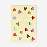 Birthday card with cut out hearts