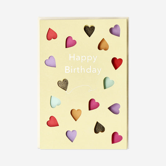 Birthday card with cut out hearts