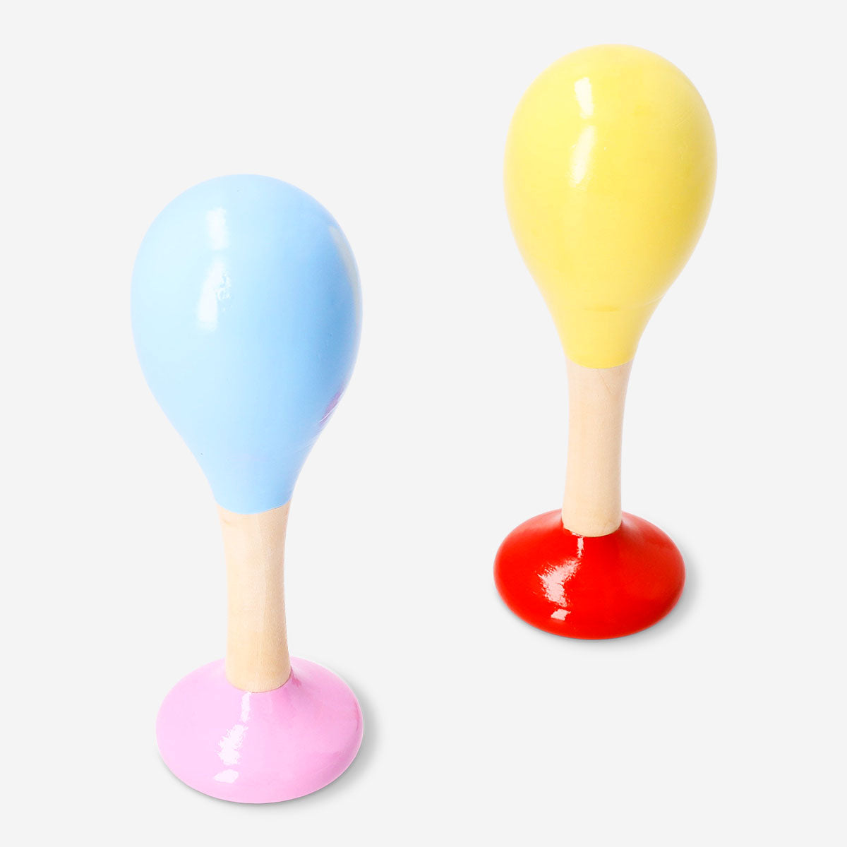 Two wooden maracas toy set by Flying Tiger Copenhagen, featuring natural wood finish and colorful handles for kids' musical play.