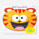 Flying Tiger Copenhagen foam disc launcher game with colorful foam discs and launcher in action.